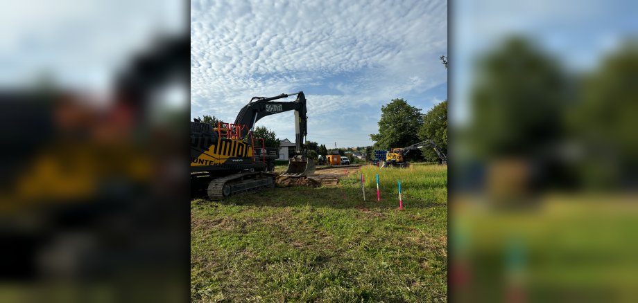 Baustellenansicht "Im Mühlenholz" mit Bagger